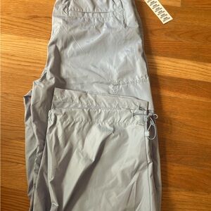 UO light green track pants baggy